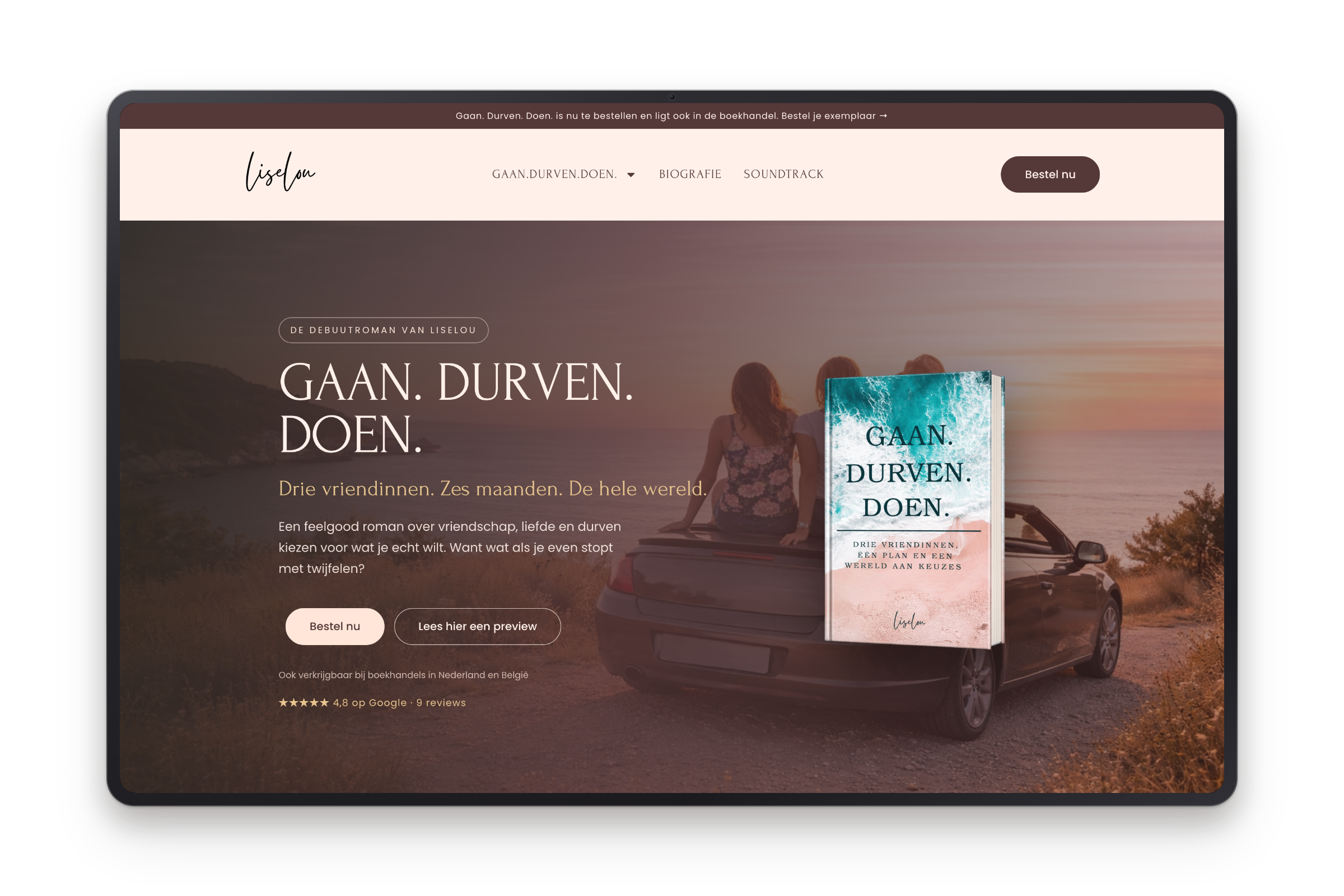 Homepagina van liselou.com in een MacBook Pro-frame